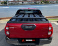 Load image into Gallery viewer, Rear view of a Hilux Rogue Tub Rack Platform by Akuma 4x4