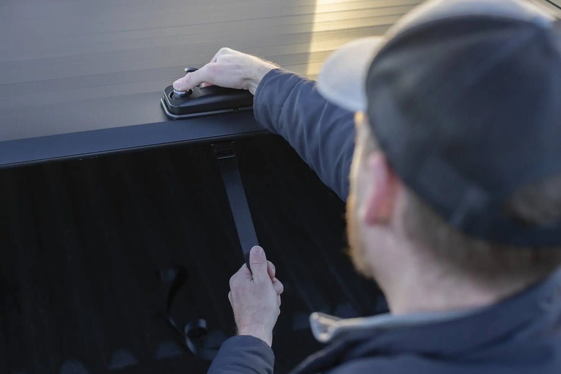 Man unlocking a ute roller shutter