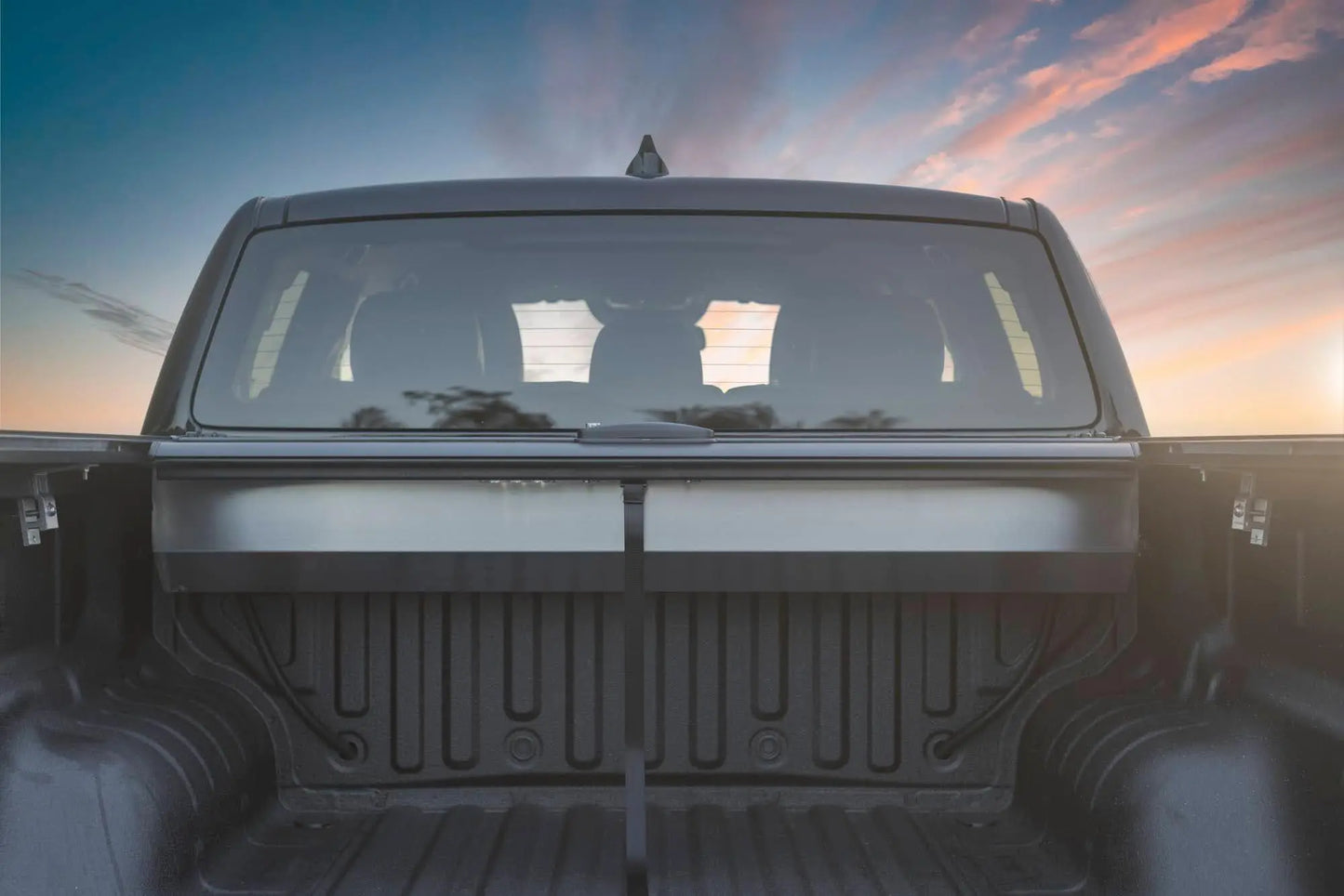 Rear view of a roller shutter made by Akuma 4x4 showing the stainless canister and pull rope