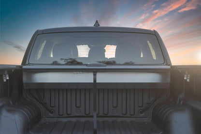 Rear view of a roller shutter made by Akuma 4x4 showing the stainless canister and pull rope