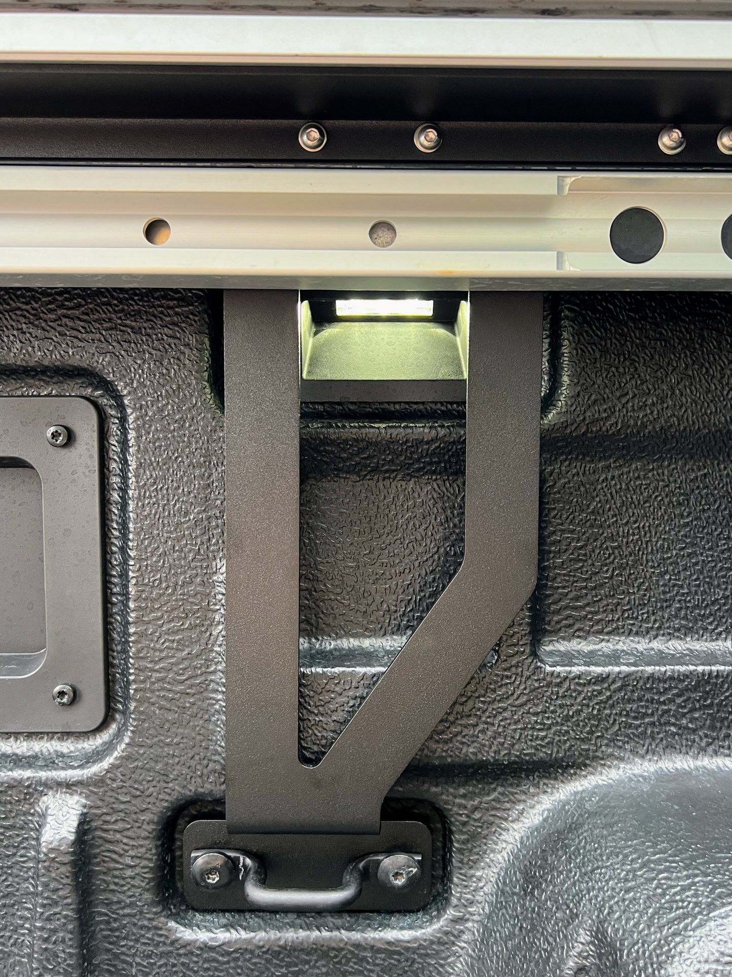 Close up of Akuma Phase Two Ford Wildtrak Roller Shutter Tub Rack Support Bracket