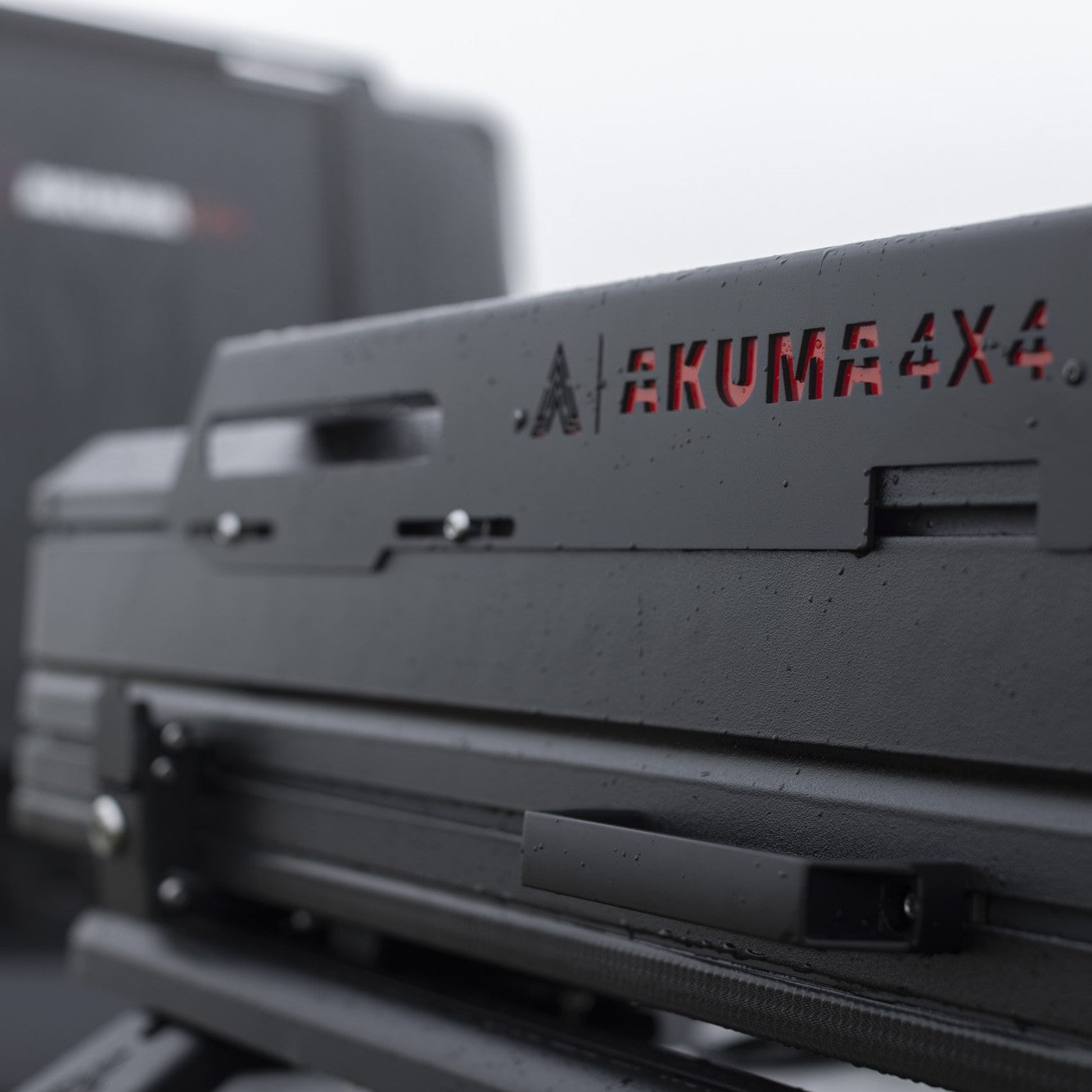Close up of Akuma logo on accessory rails fitted to Tub Mount tent