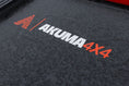 Load image into Gallery viewer, Close up of logo on top of hardshell tent made by Akuma 4 x 4
